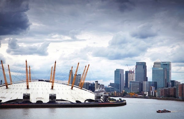 the O2 dome is featured prominently against the London Skyline