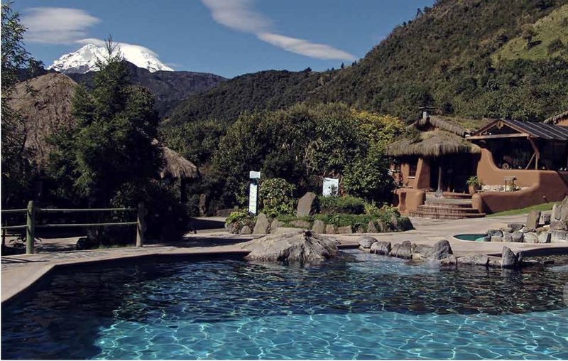 Caption Thermal springs of Papallacta with Antisana volcano in the backX