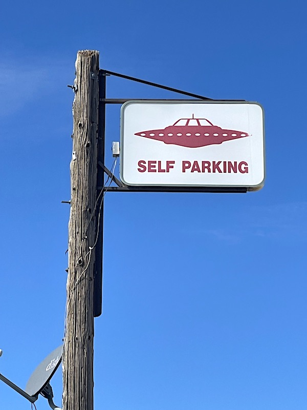 A flying saucer parking sign at the Little A’le’Inn