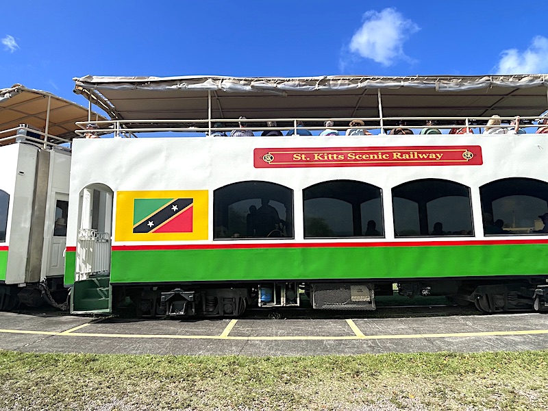 A train coach of the St. Kitts Scenic Railway decorated with the national flag