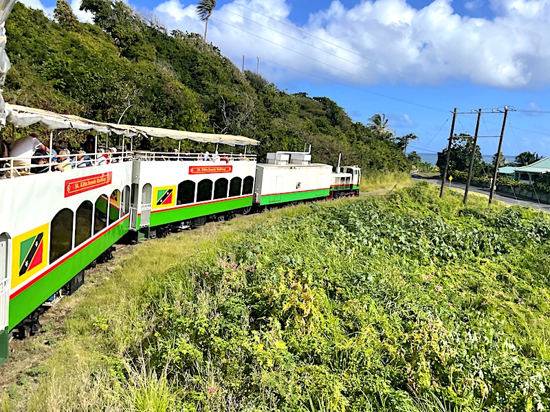 The St. Kitts Scenic Railway hugging a hill along the coastal railway route