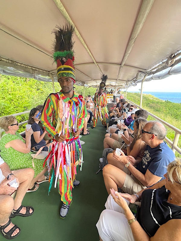 A performance of native dance and songs along the route of the St. Kitts Scenic Railway