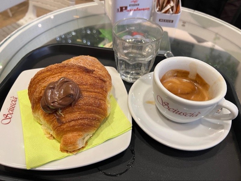 A typical Milanese breakfast involves an Espresso and a Brioche (oh, in Milan, a Croissant is called a Brioche).