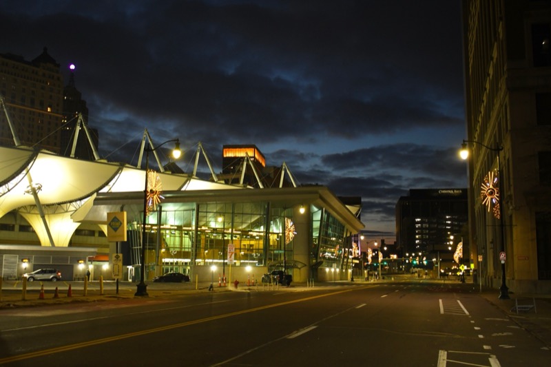 Cass Avenue with the bus terminal at night.