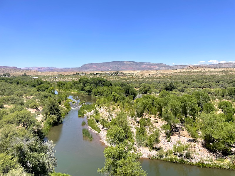 The Verde River meandering along alongside the pathway of the Verde Canyon Railroad
