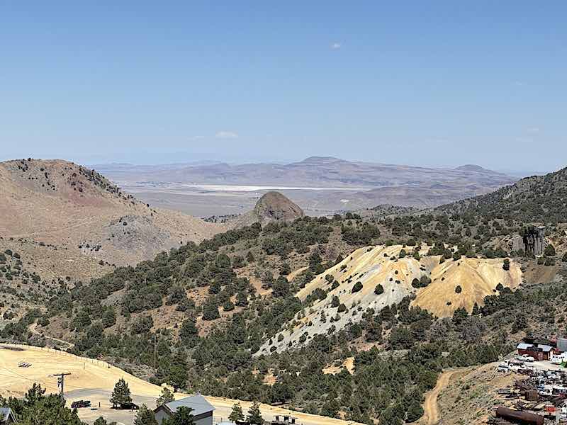 An abandoned Comstock Lode mine with Virginia City’s famous 100-mile view of the Great Basin in the background