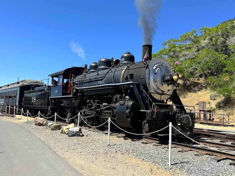 The Virginia and Truckee Steam Locomotive Number 18 arriving at Virginia City from Carson City