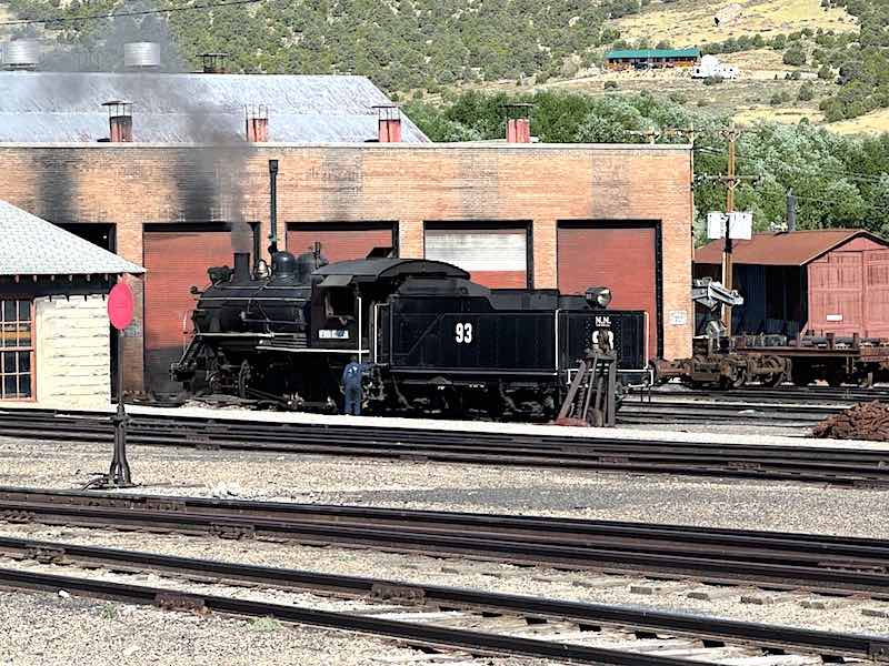 Steam Engine 93 being prepared at the maintenance and machine shop for the day’s journey