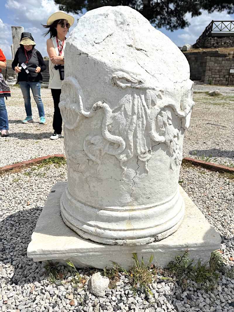 A monument at the Asclepieion featuring serpents associated with the art of healing