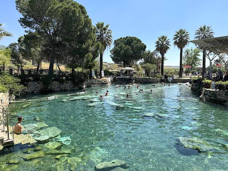 The thermal waters of Cleopatra’s Pool at Hierapolis featuring submerged fragments of columns