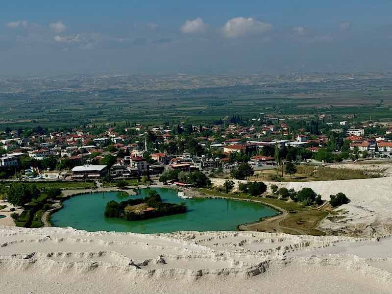 The view from the travertine terraces of Pamukkale overlooking the hotels and town below