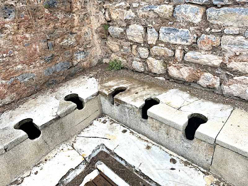 A Roman public toilet facility along the Curetes Way